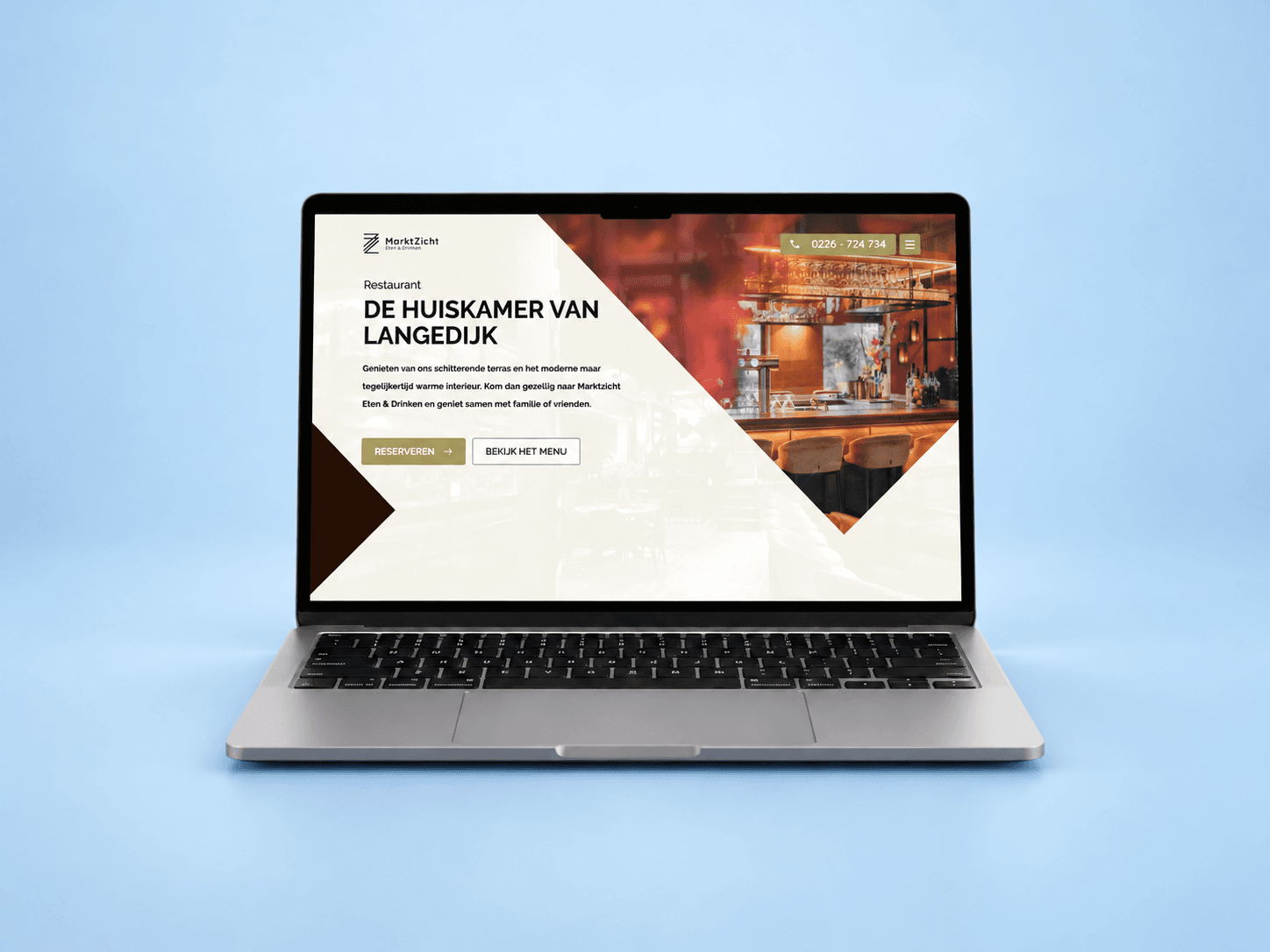 Marktzicht Eten & Drinken website weergegeven op een laptop