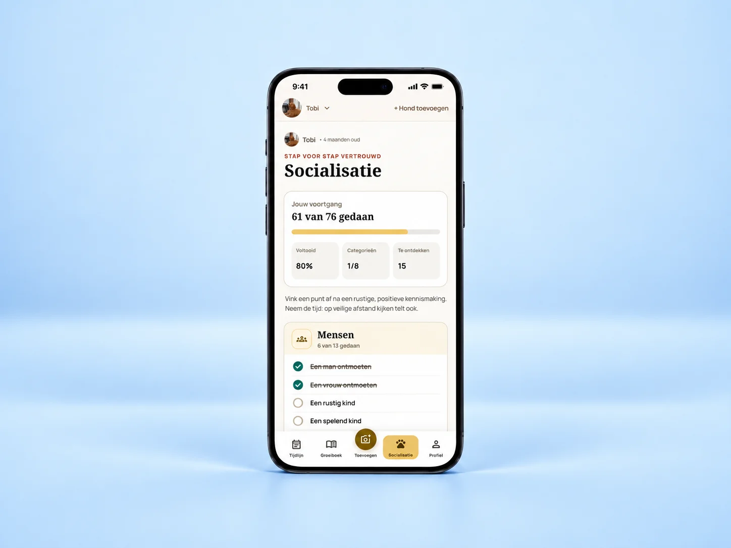 Tijdlijn in de PuppySteps-app met een foto en mijlpaal